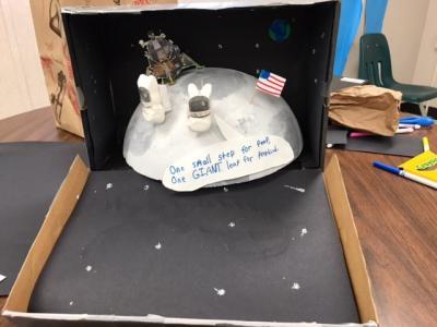 photo of student made shadow boxes
