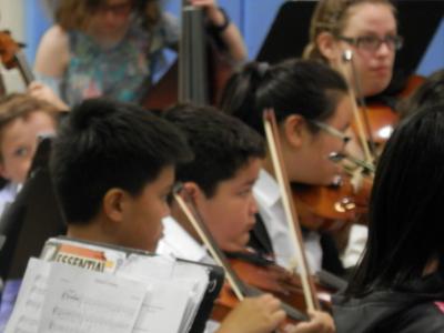 students playing in the strings concert